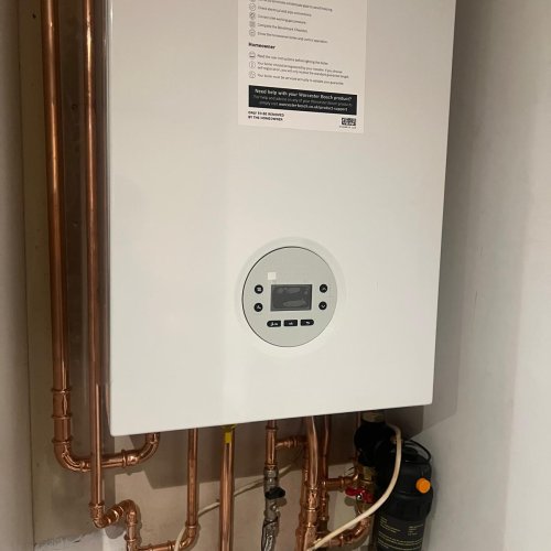 New combi boiler with fully re-run copper pipework